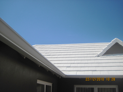 Completed Seamless Gutter system in white.
